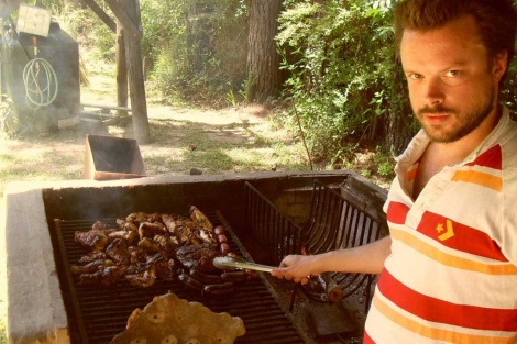 Daniel Tunnard cooking an asado in Argentina