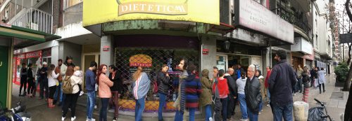Crowd waiting in line for locro at Ña Serapia 