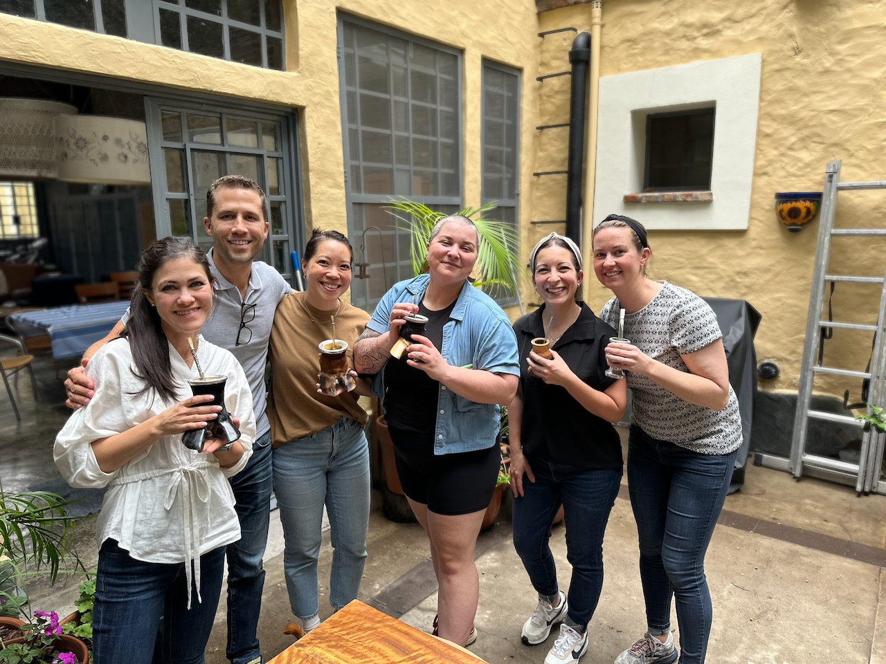 Asado Adventure guests sharing mate in a Palermo Viejo courtyard